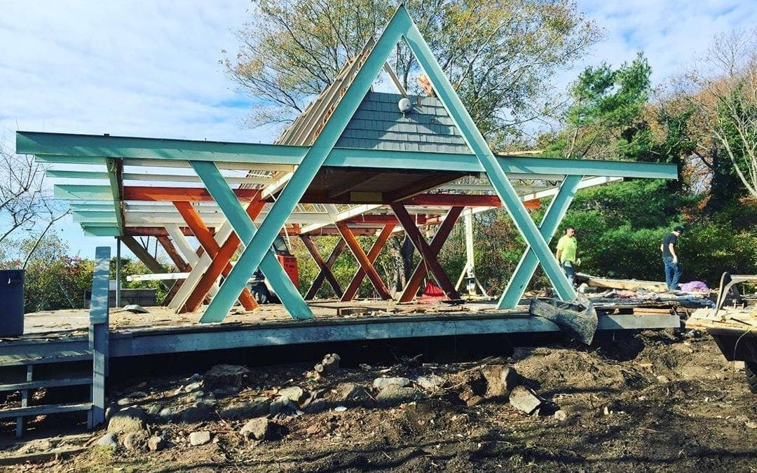 Home renovation in Gloucester. We gutted out this home in Gloucester a few years ago and kept this beautiful A-Frame in tact for the remodel #aframe #gloucesterma #quickdisposal #homedemo #homerenovation #dumpsterrental